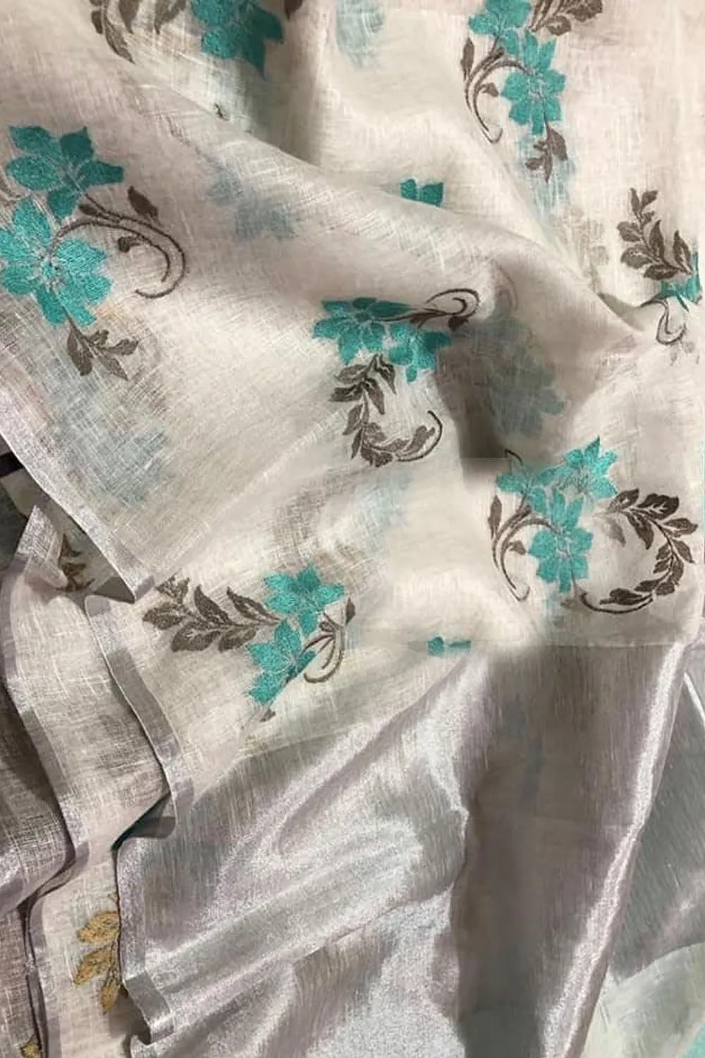 Stunning Off White Linen Saree with Intricate Embroidery