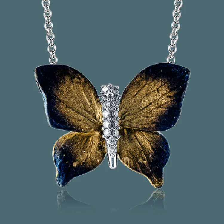 This stunning contemporary butterfly pendant features a stunning .10 ctw white diamond encrusted body to create an incredibly realistic design.